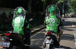 Menimbang Dampak Pemangkasan Biaya Aplikasi Ojek Online